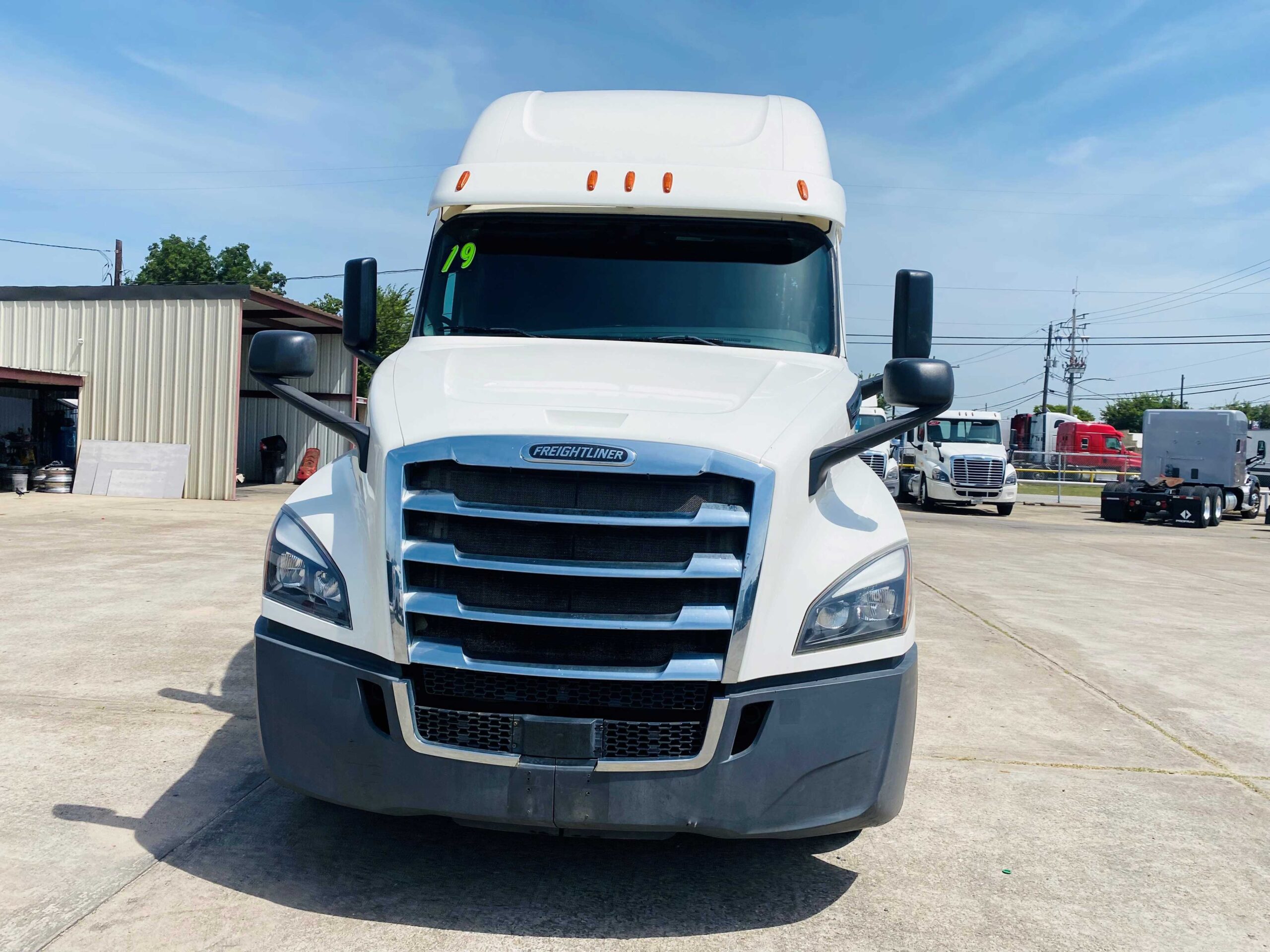 Front view of a white semi-truck