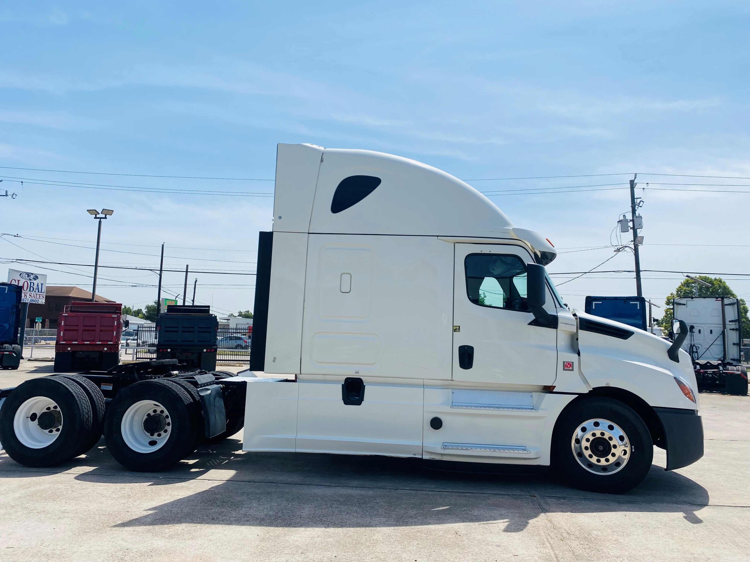 White semi-truck parked outdoors