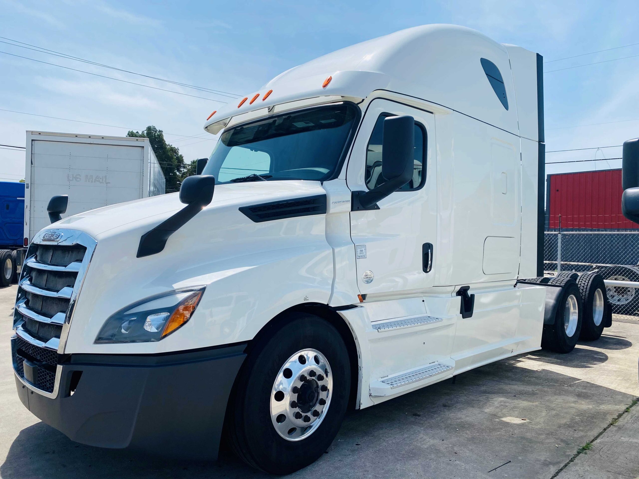 Large white truck with sleeper cab