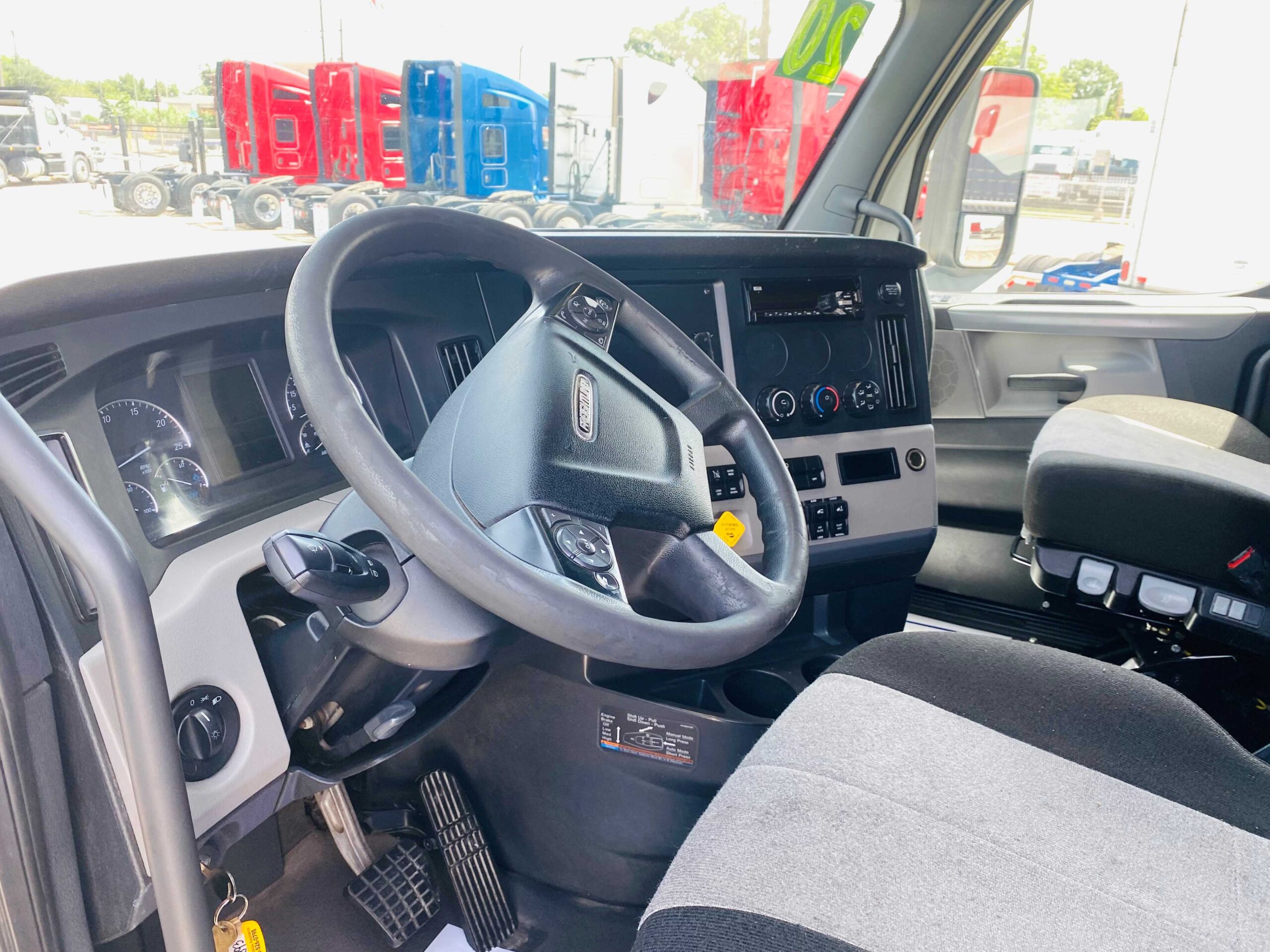 Inside view of a semi-truck cabin