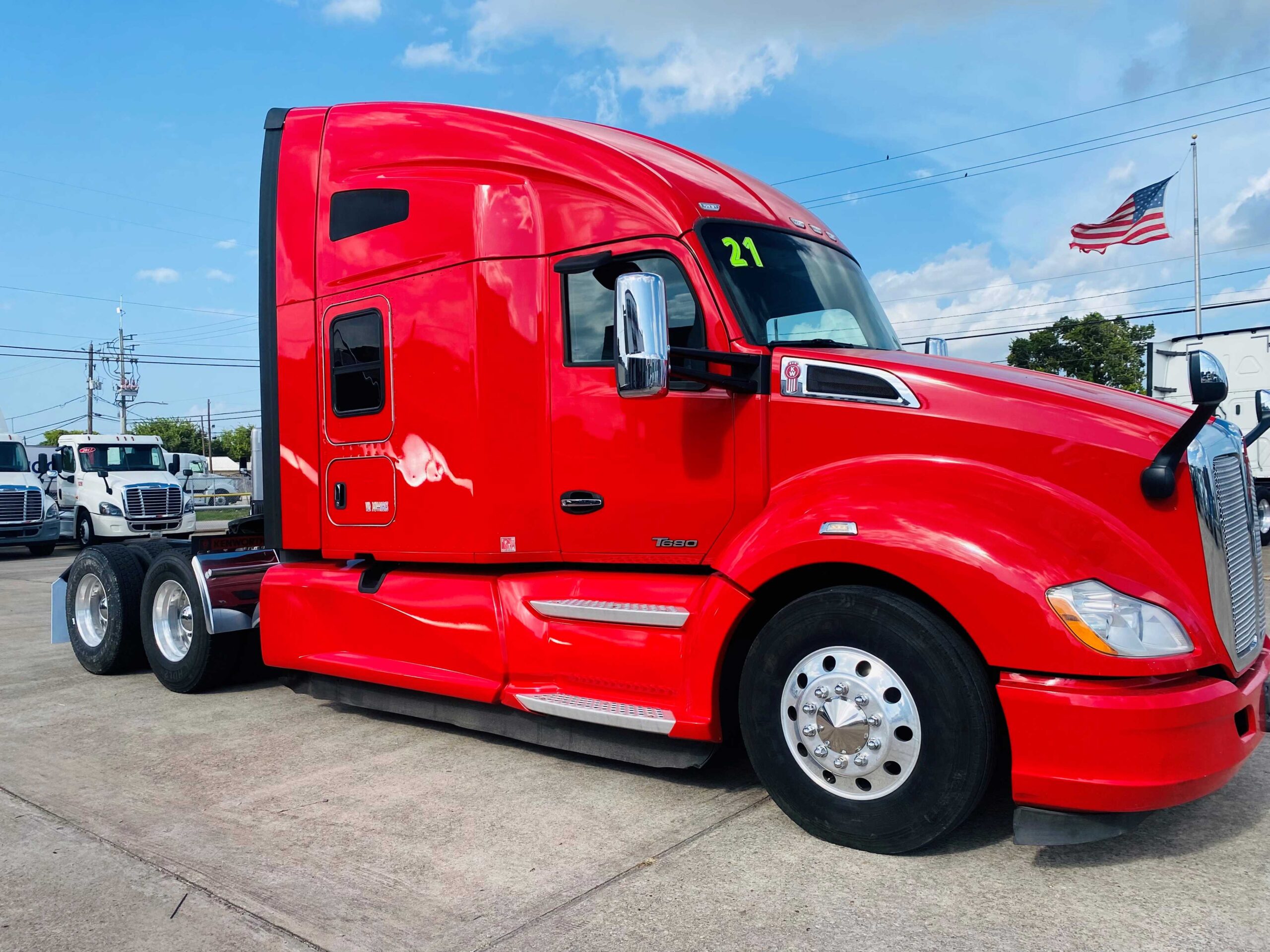 Red semi-truck parked outdoors