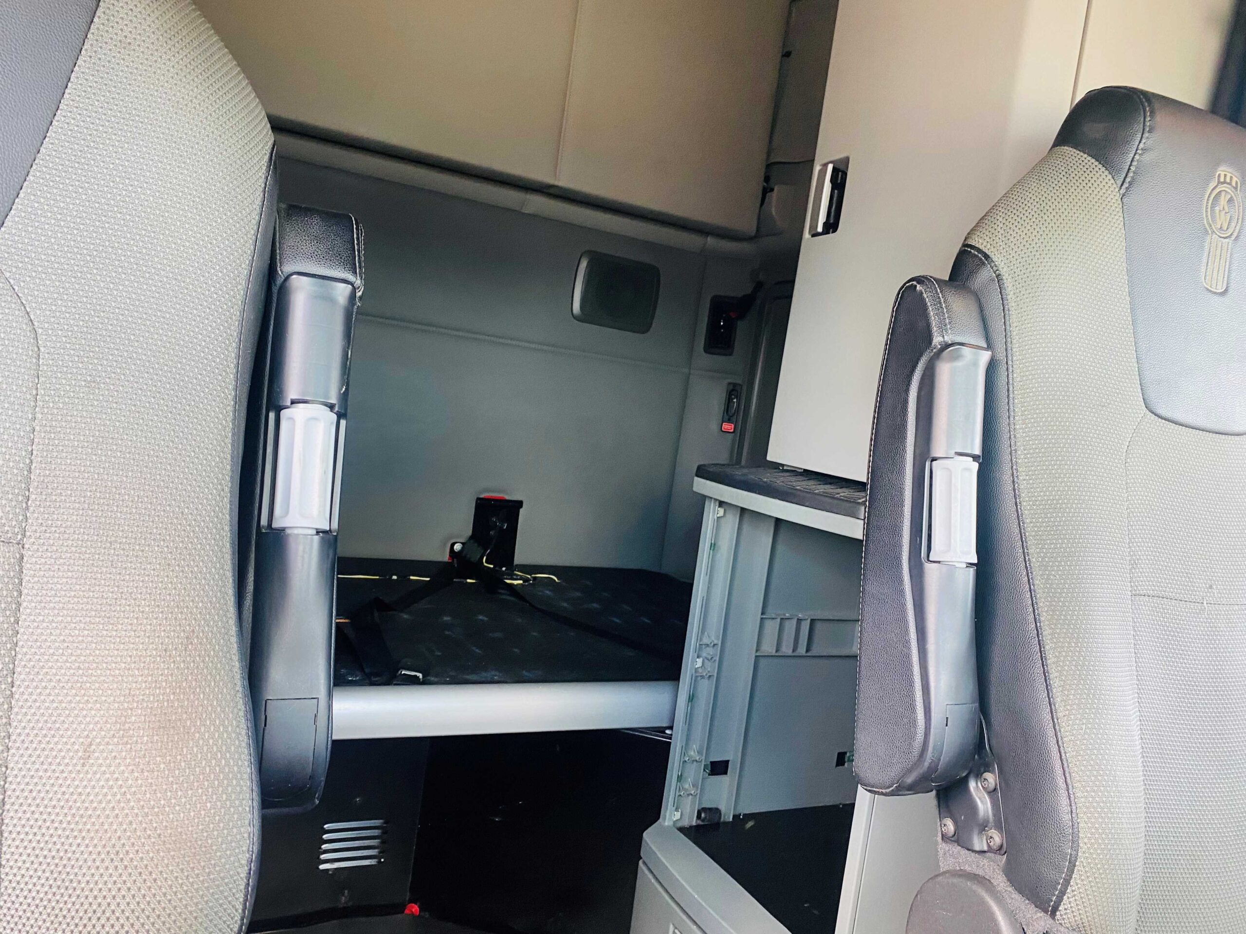 Truck cabin interior with seats