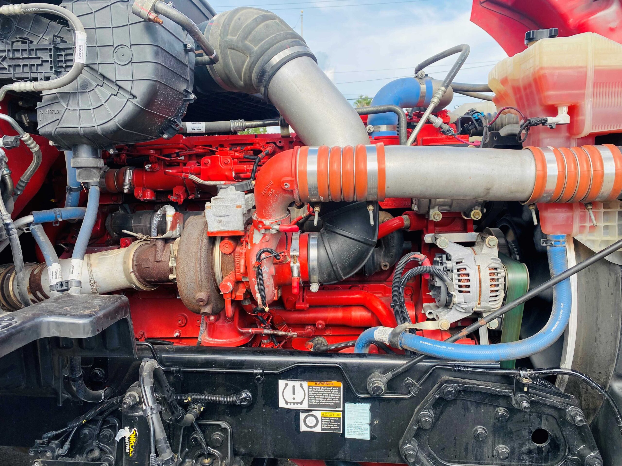 Truck engine showcasing pipes and machinery