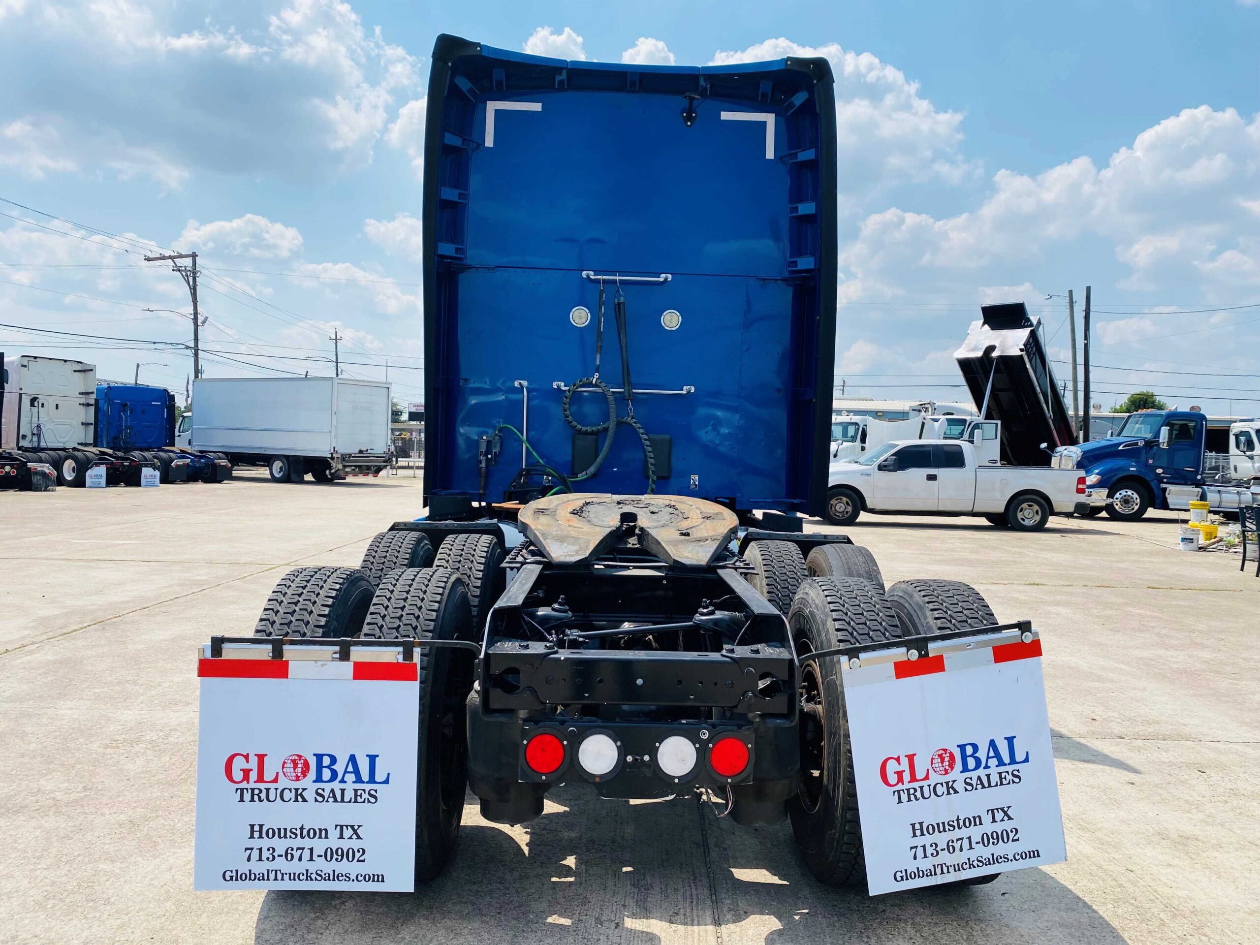 Commercial trucks parked outdoors