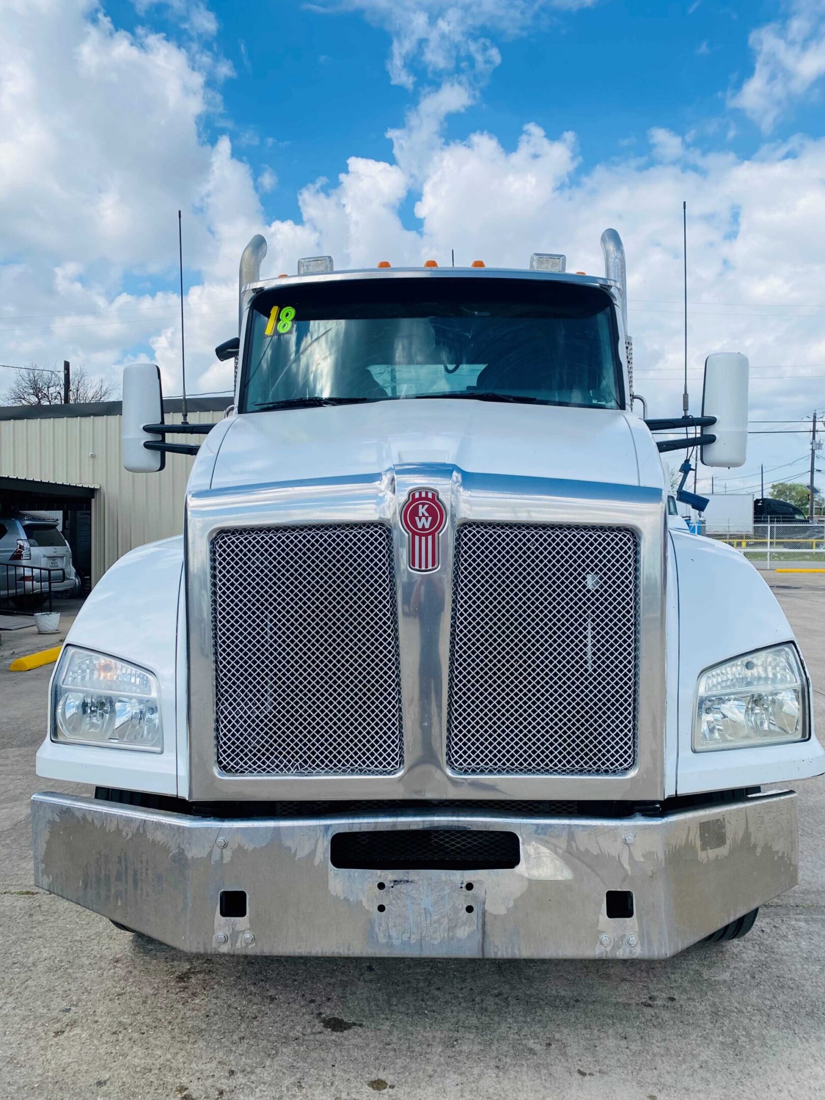 Semi-truck under blue sky