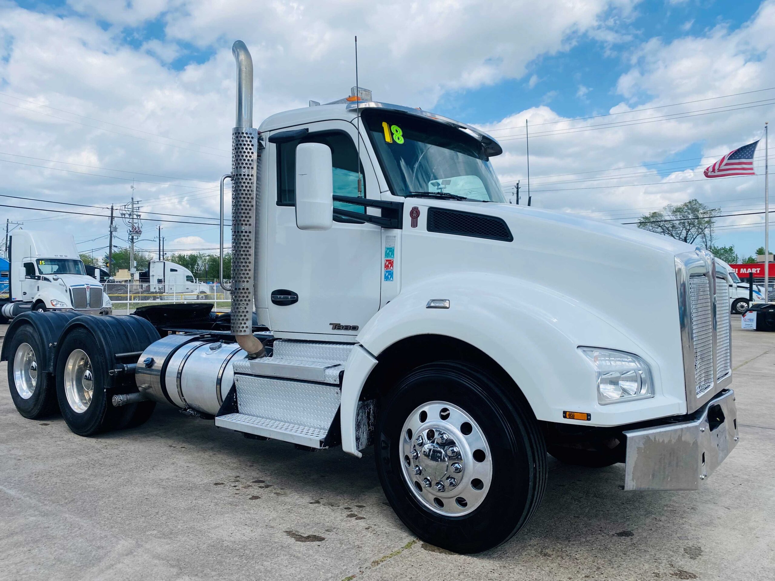 Commercial truck with American flag background