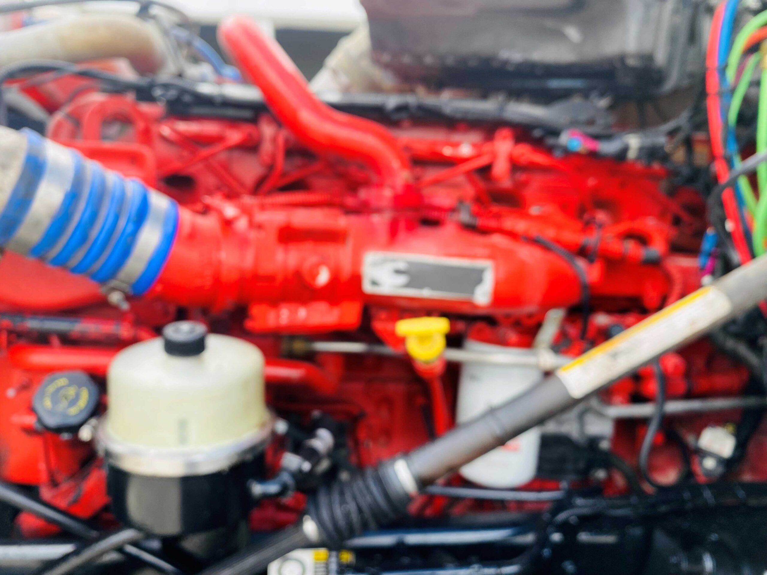 Red engine with colorful wiring