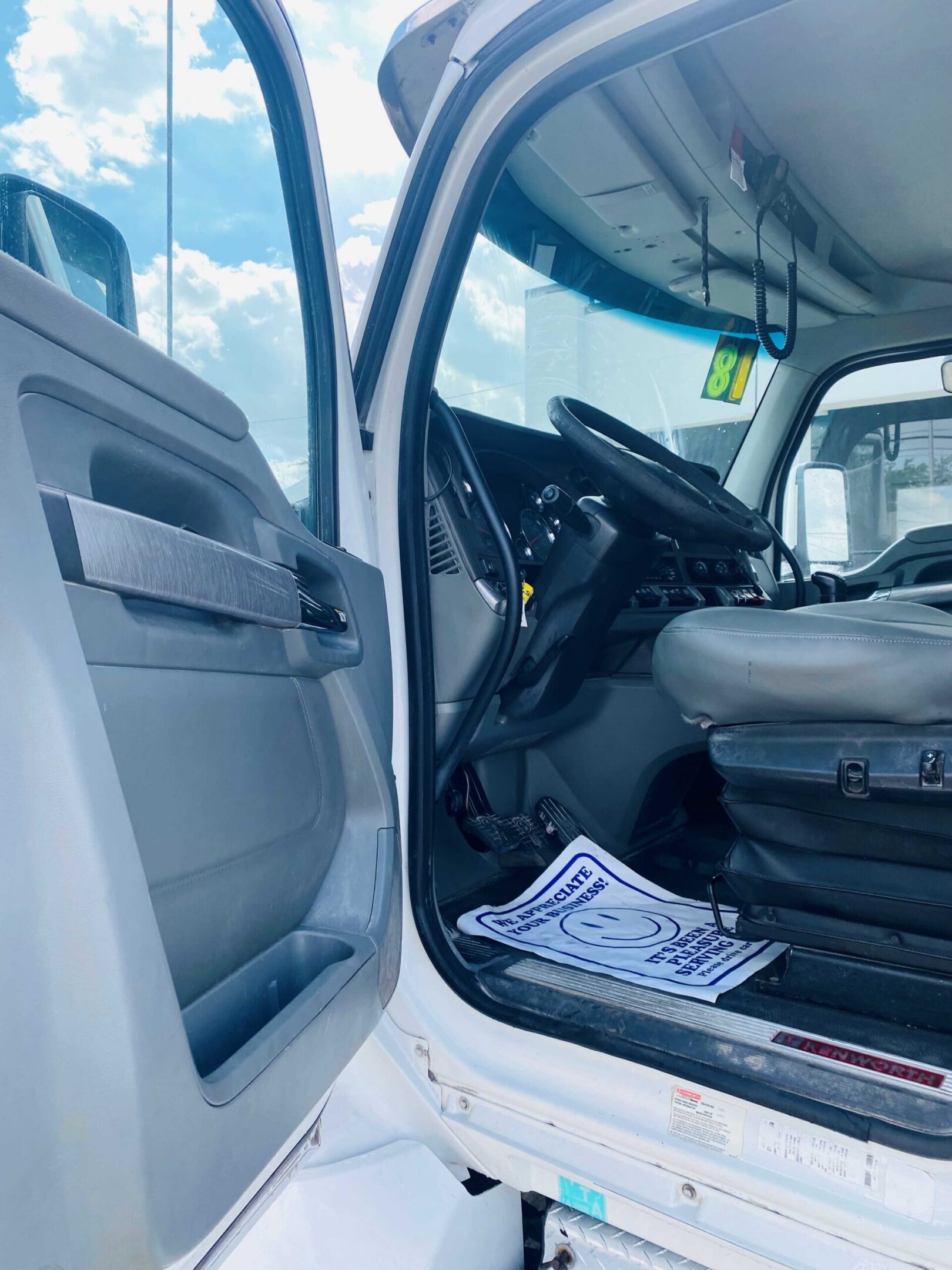 View inside a white truck cabin