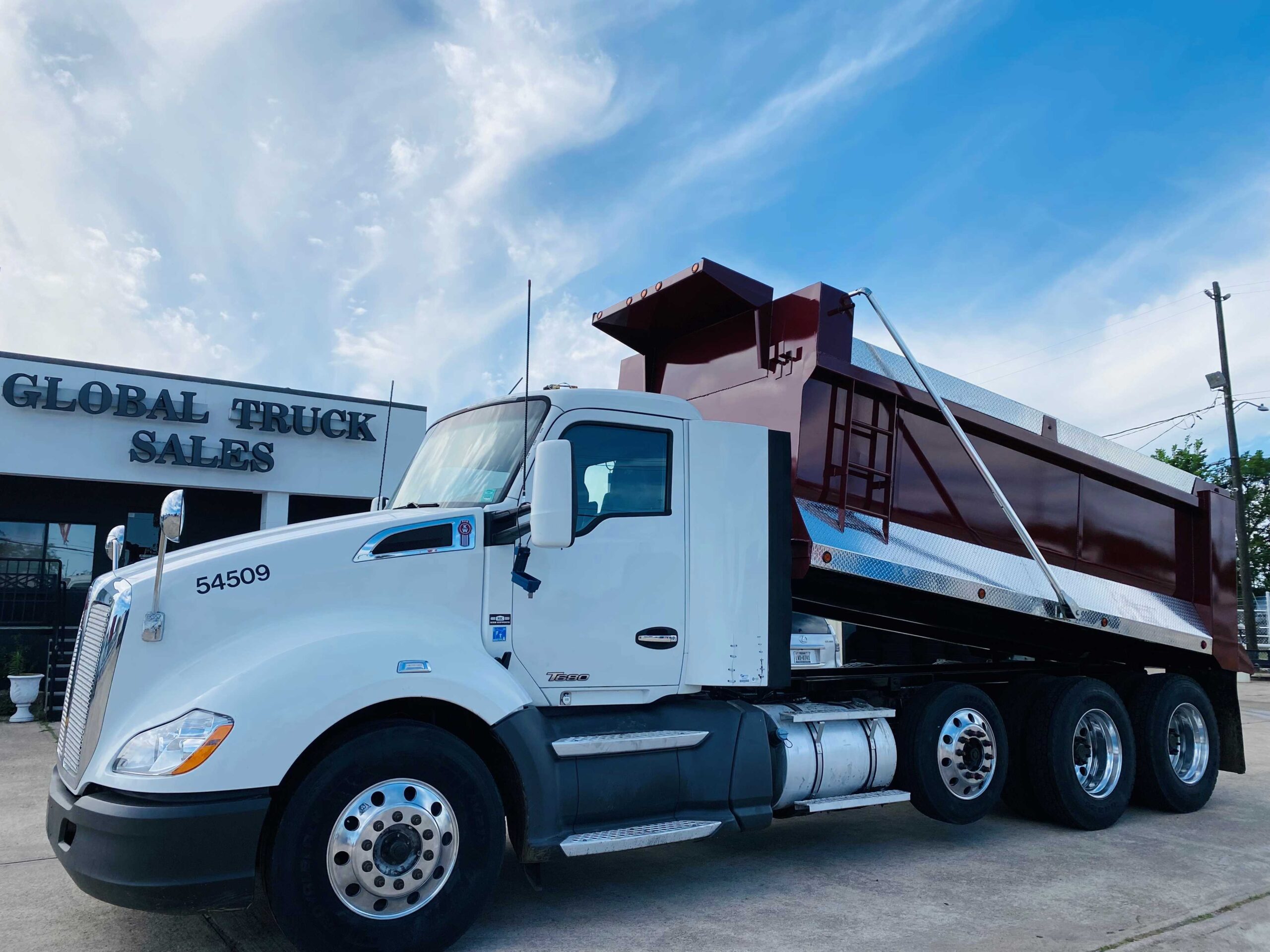 Heavy-duty truck near sales building