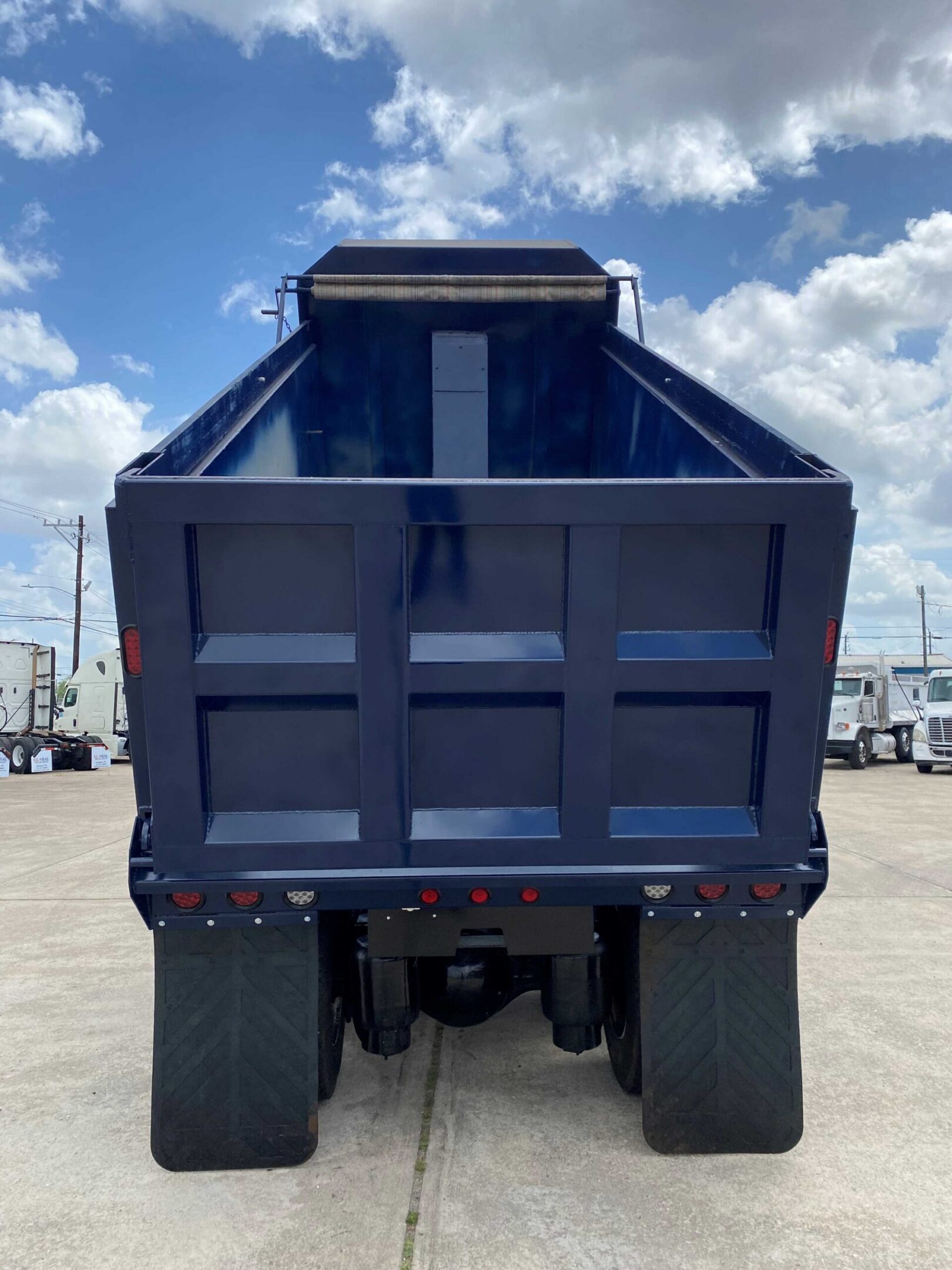 Industrial dump truck parked outside