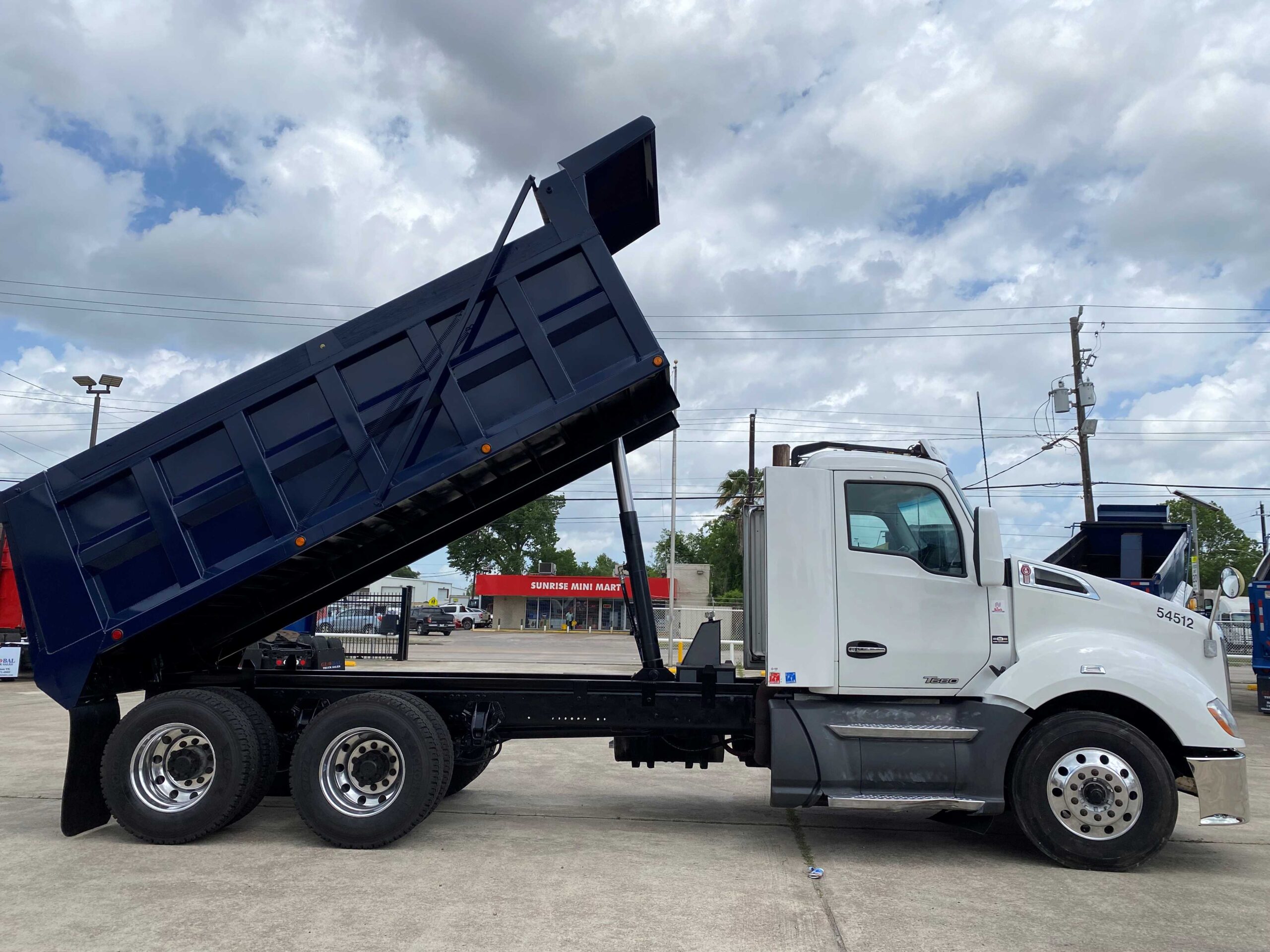 Dump truck parked on concrete surface