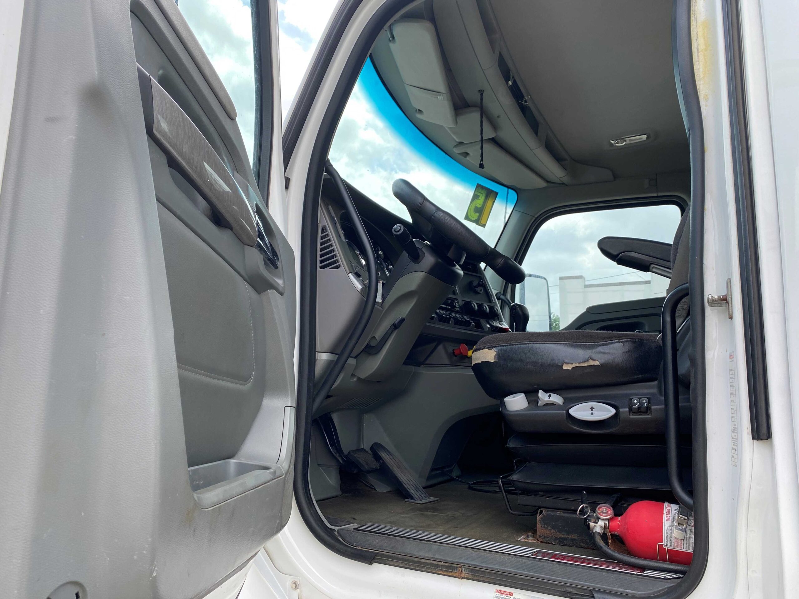 Inside view of truck cab and seat