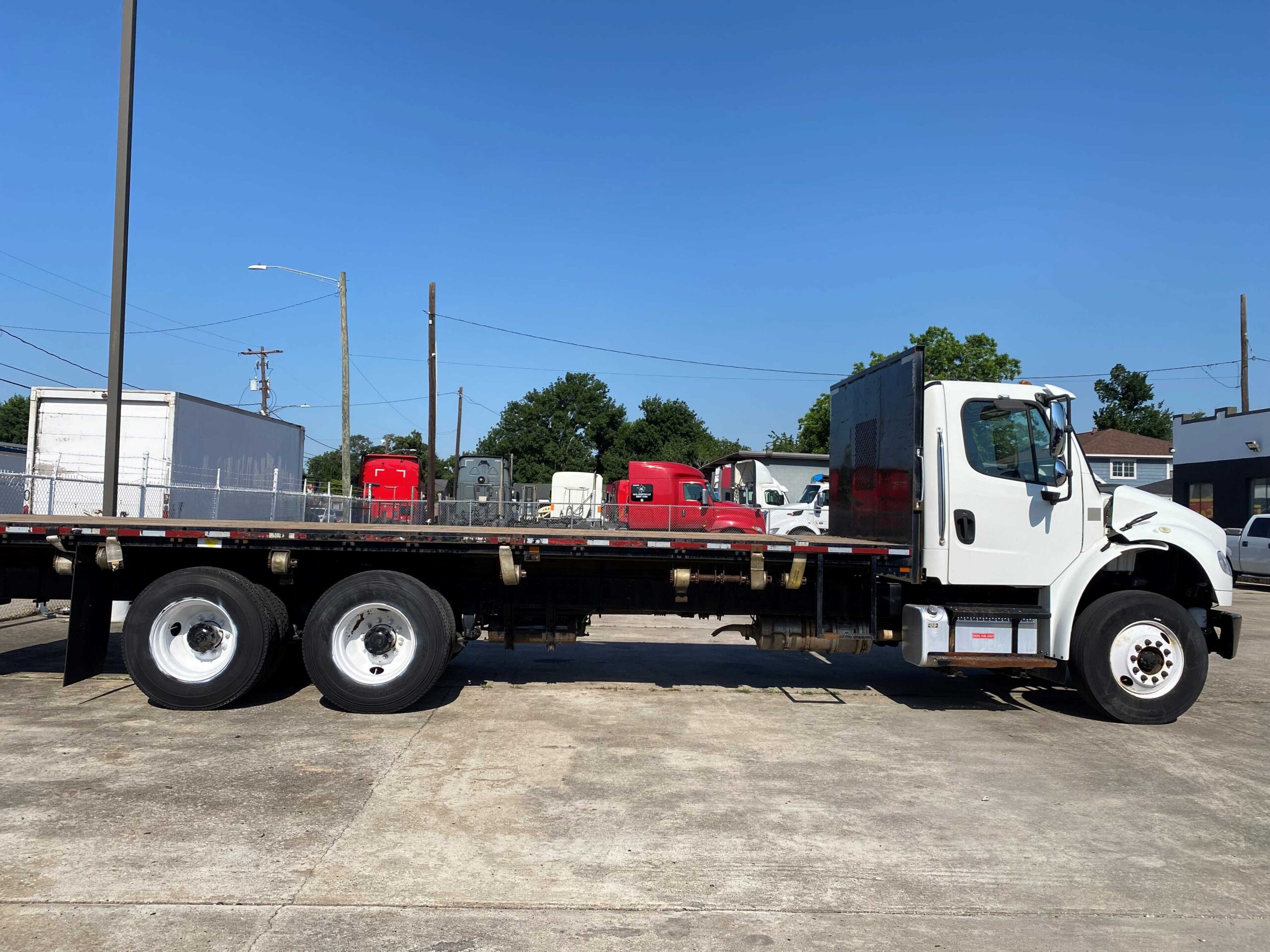 Heavy-duty flatbed truck side view