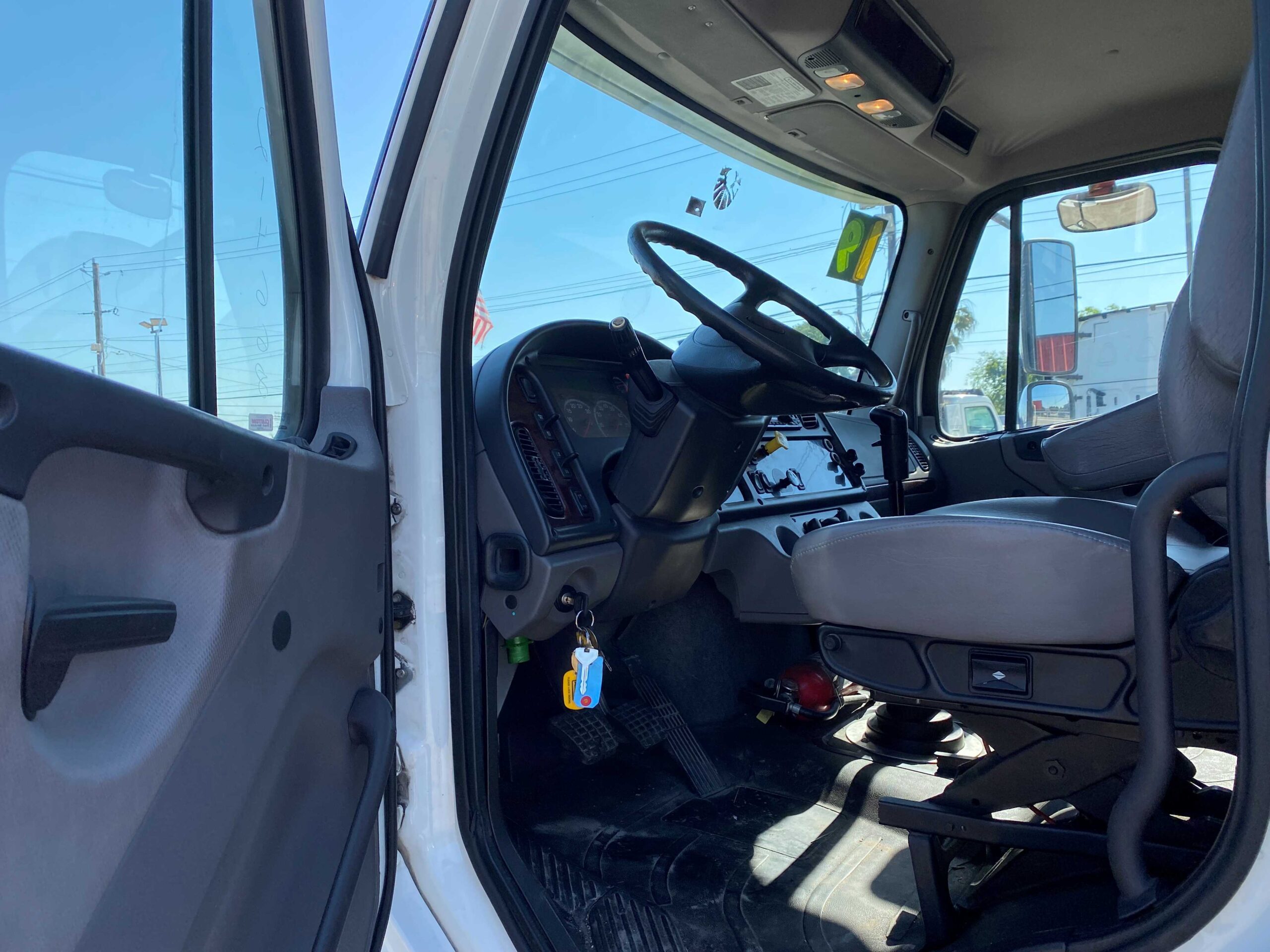 Open truck door showing cockpit